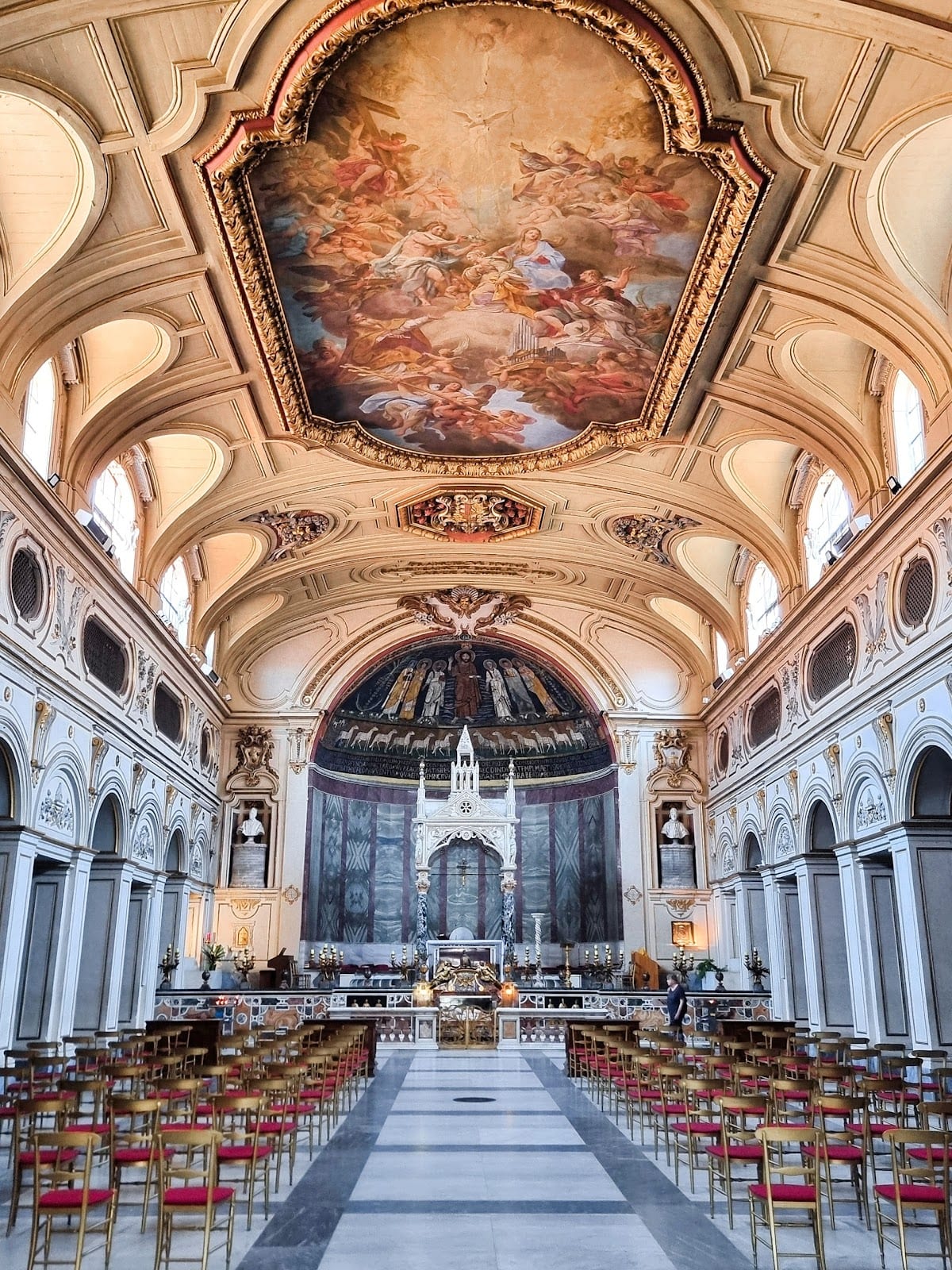 The frescoed nave and ciborium of Santa Cecilia in Trastevere.