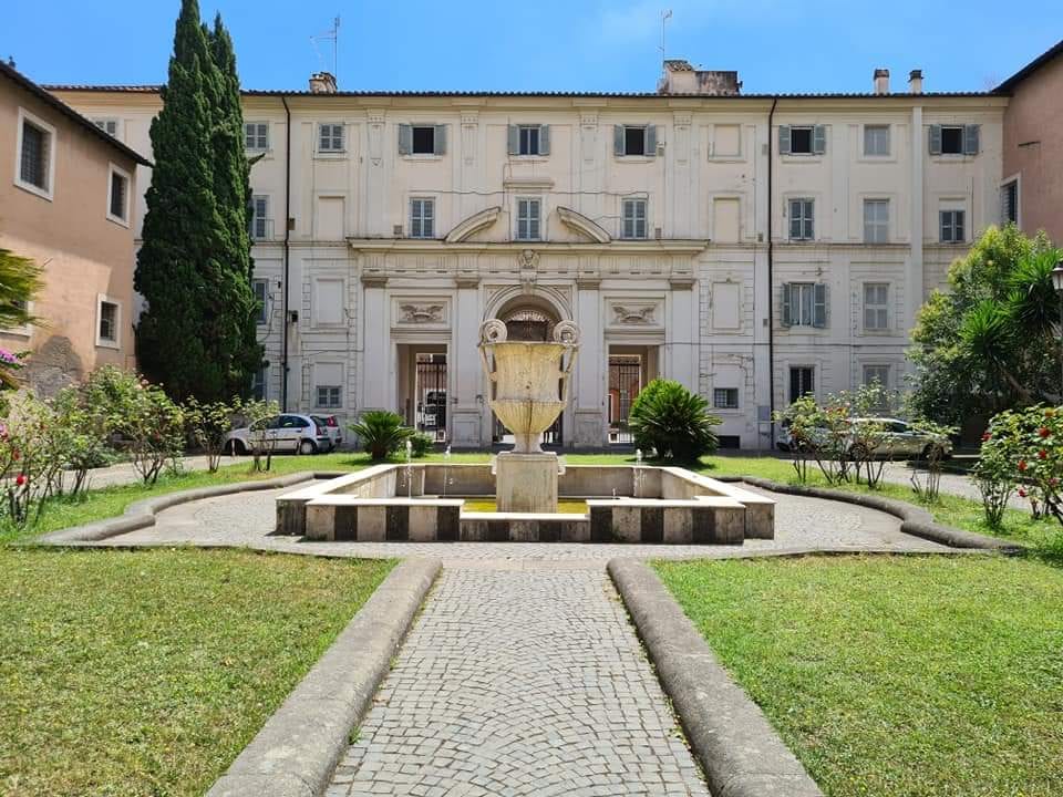 The forecourt and facade of Santa Cecilia in Trastevere.