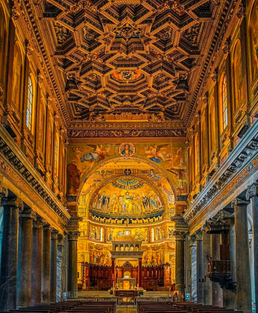 The golden 12th and 13th-century mosaics in the apse of Santa Maria in Trastevere.
