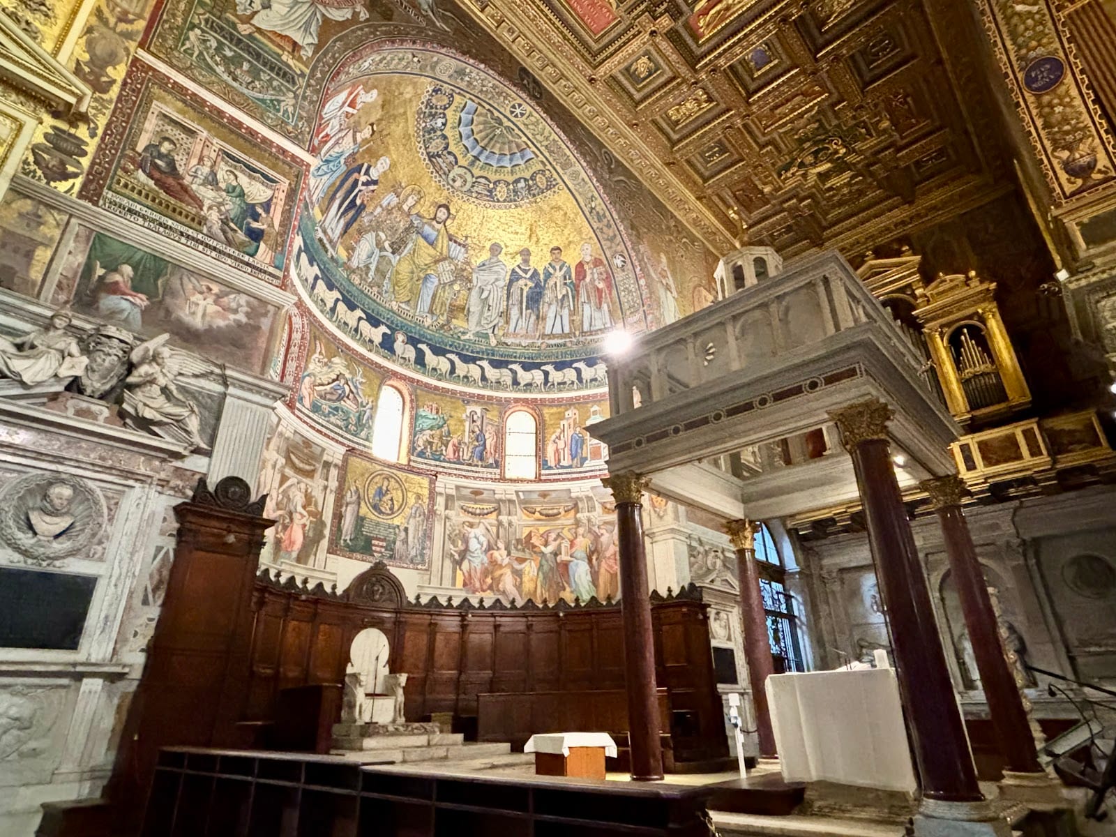 The mosaic apse and nave of the Basilica di Santa Maria in Trastevere.