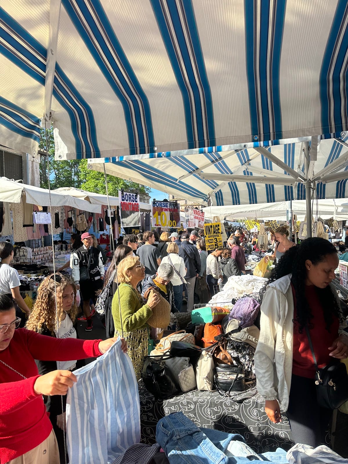 Crowds browsing the stalls at the Porta Portese Sunday market.