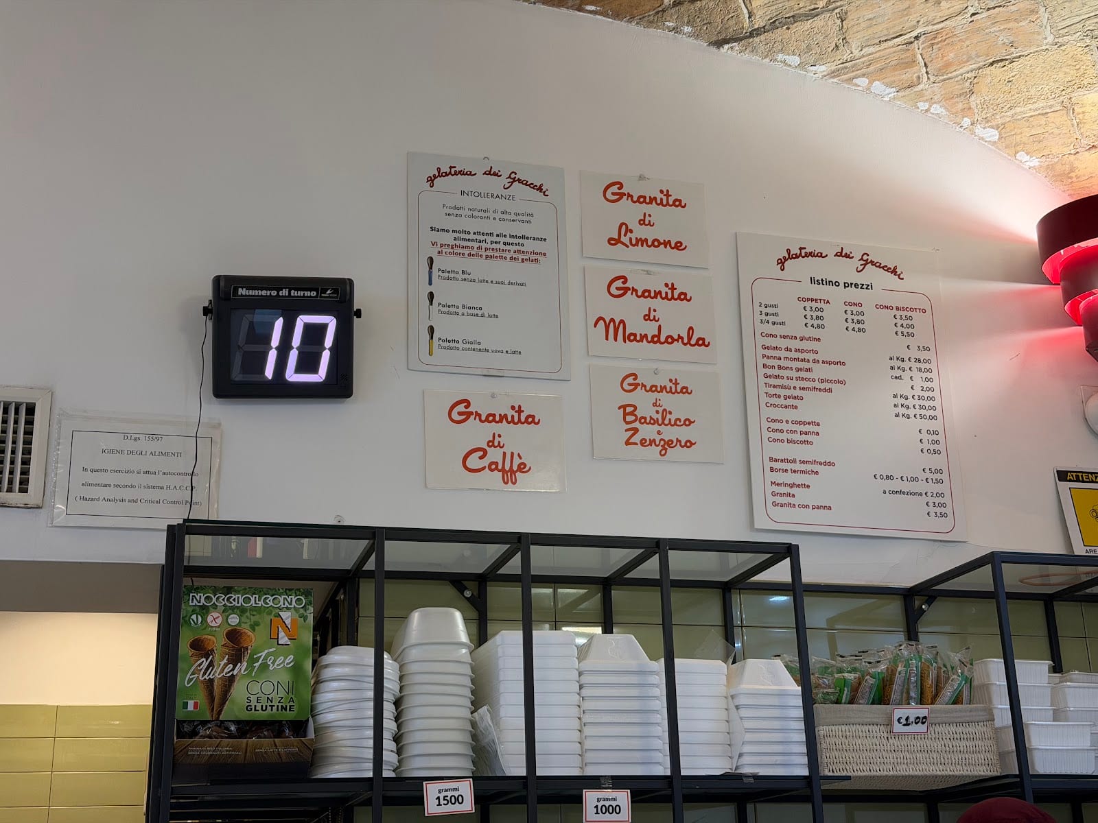 The menu board inside Gelateria dei Gracchi.