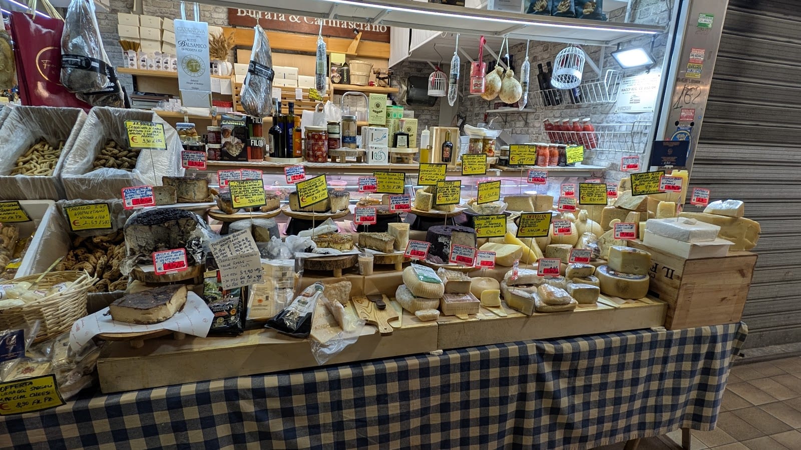 A cheese and cured-meats stall at the Mercato Trionfale.