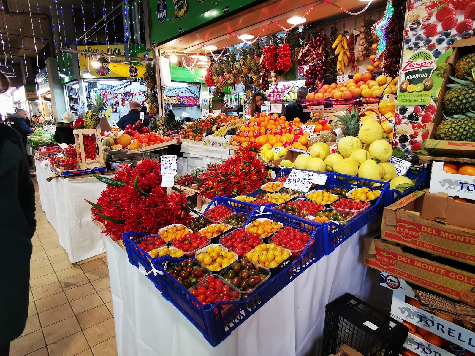 A colorful fruit and vegetable stall at the Mercato Trionfale.