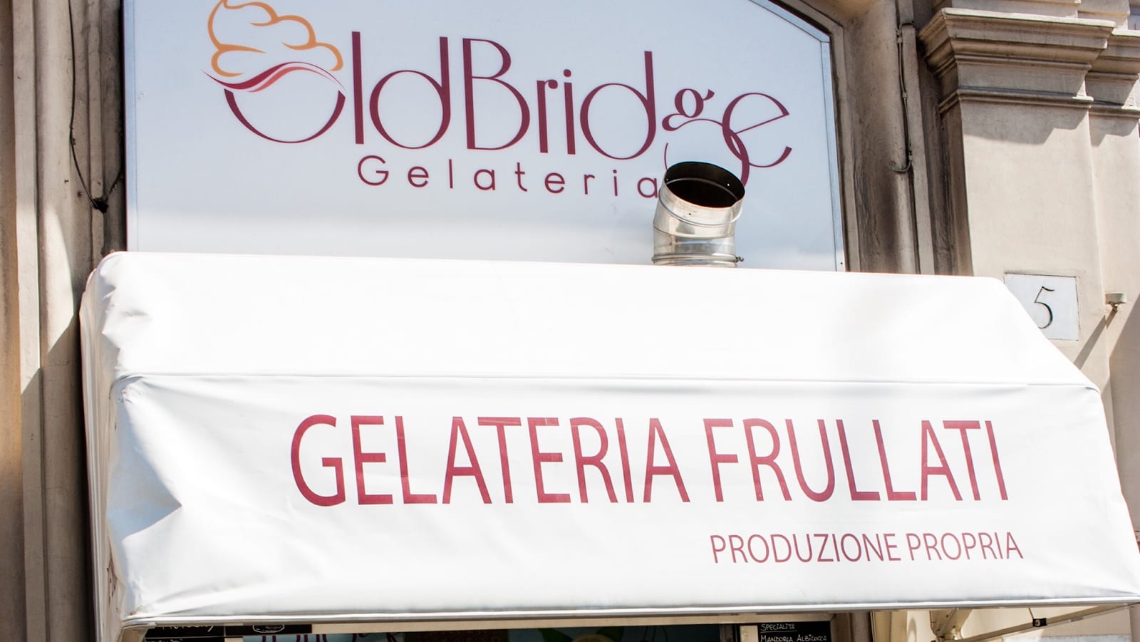 The Old Bridge Gelateria awning by the Vatican walls.