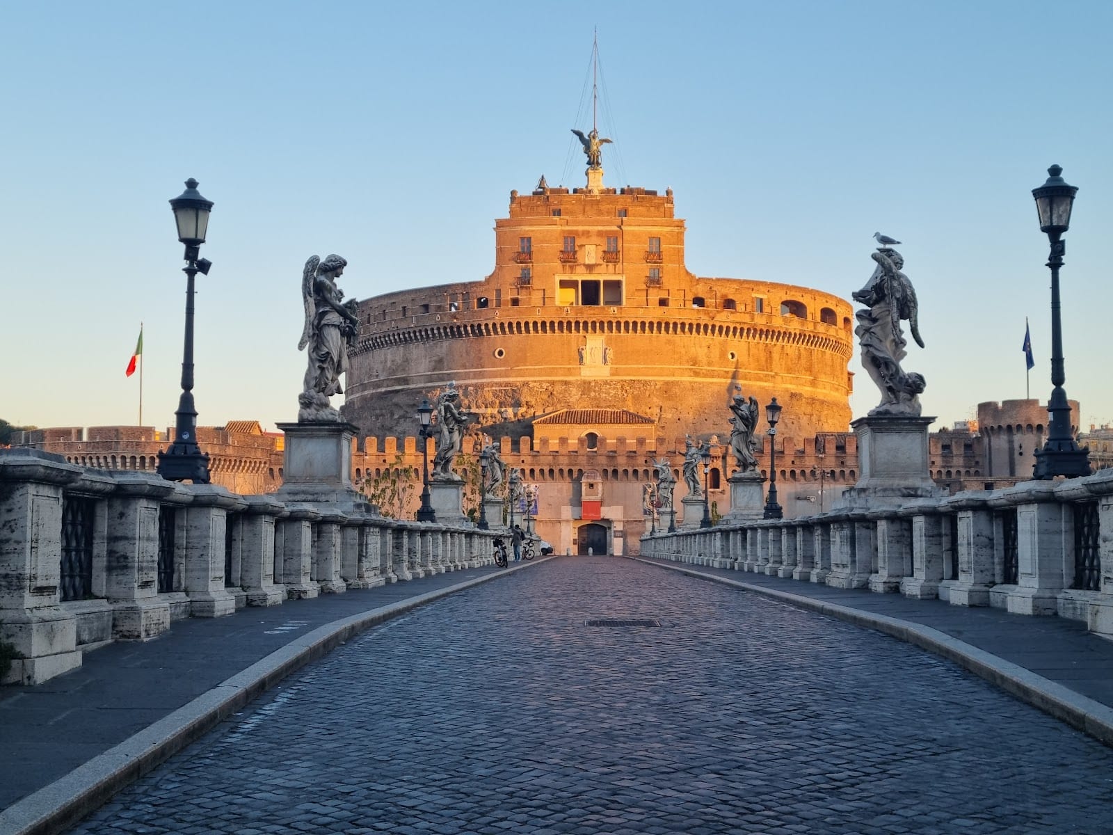 Looking along the Ponte Sant'Angelo, lined with Bernini's angel statues, toward Castel Sant'Angelo.