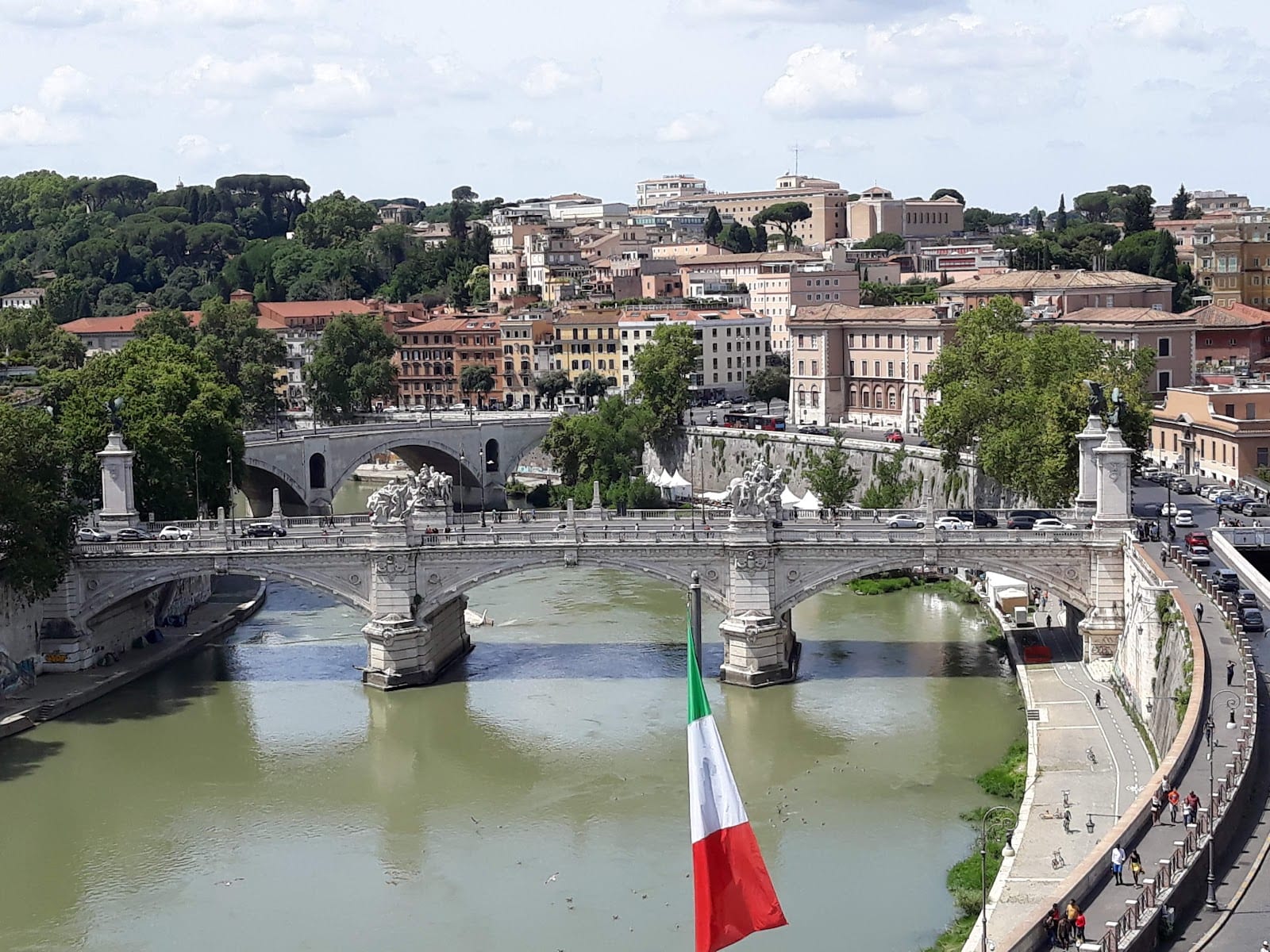 The Ponte Sant'Angelo crossing the Tiber with central Rome behind it.