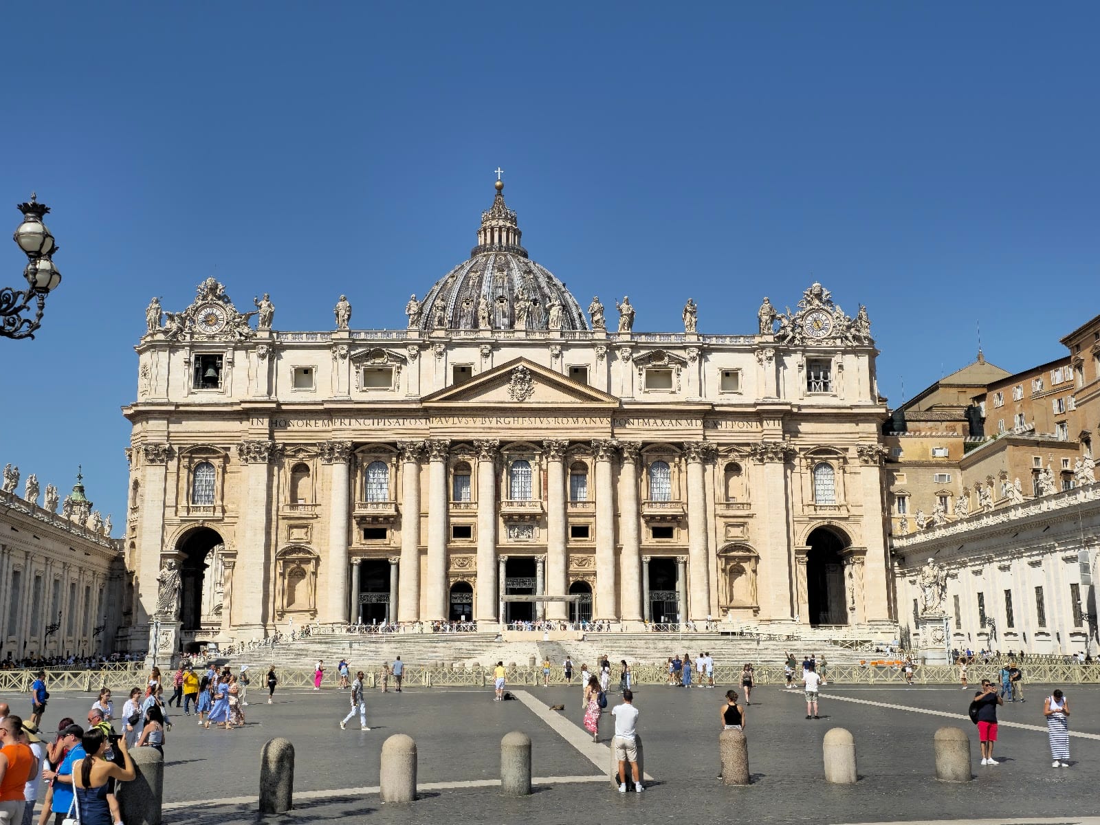 The facade of St Peter's Basilica seen across St Peter's Square in the Vatican, Rome.