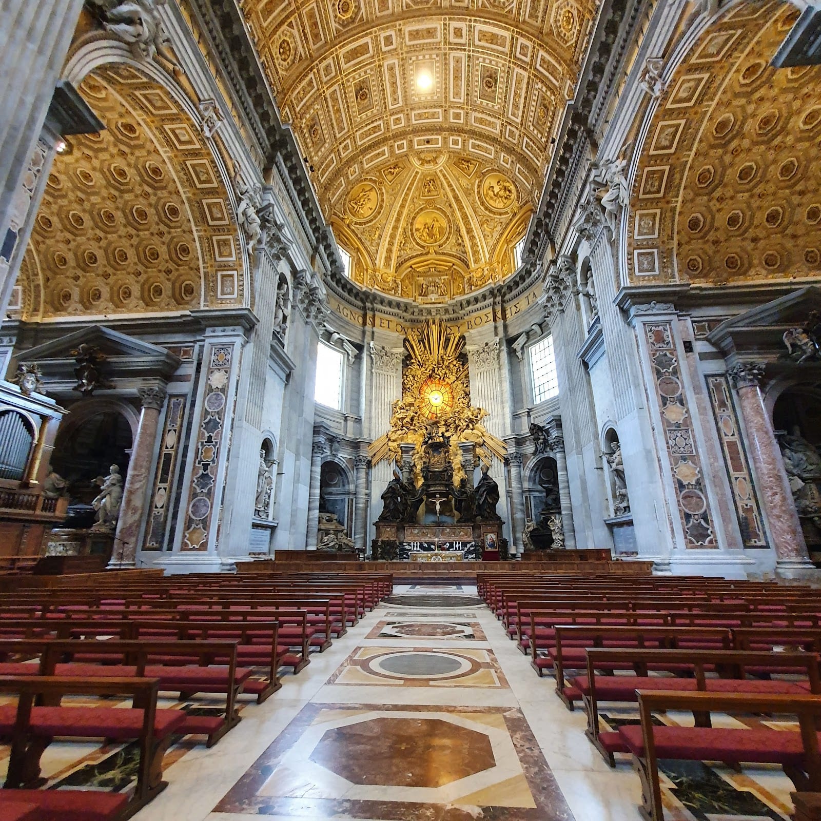 The nave of St Peter's Basilica looking toward the altar.