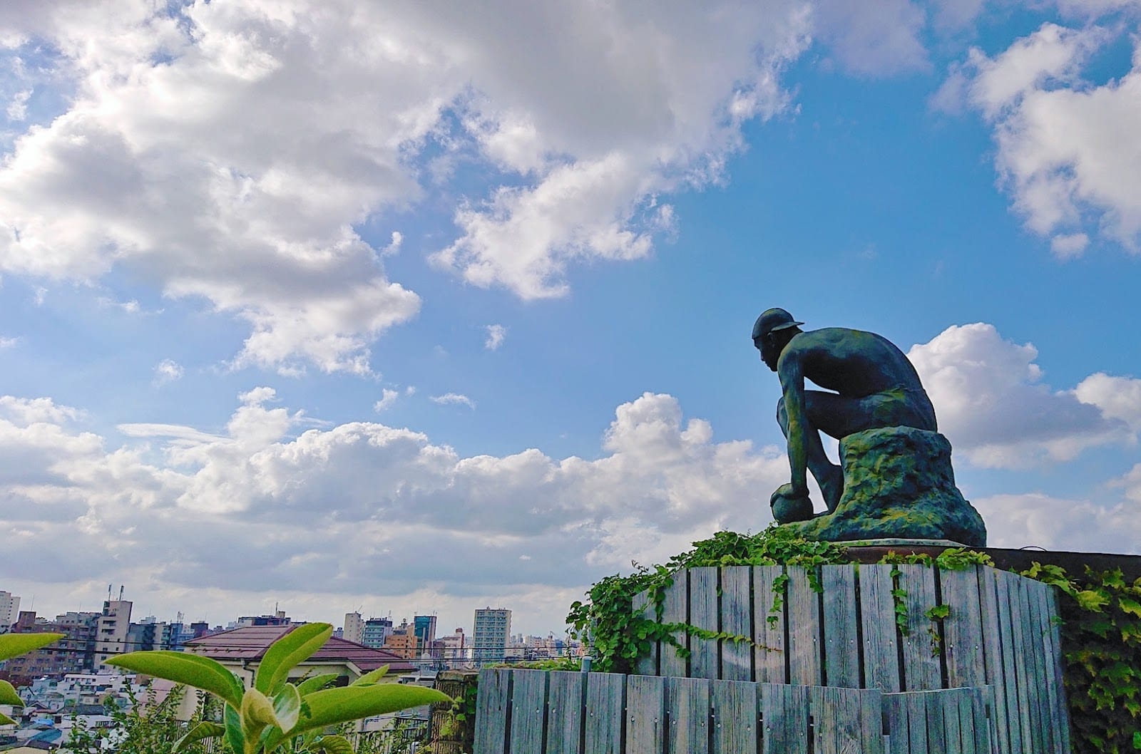 A bronze figure on the rooftop garden of the Asakura Museum.