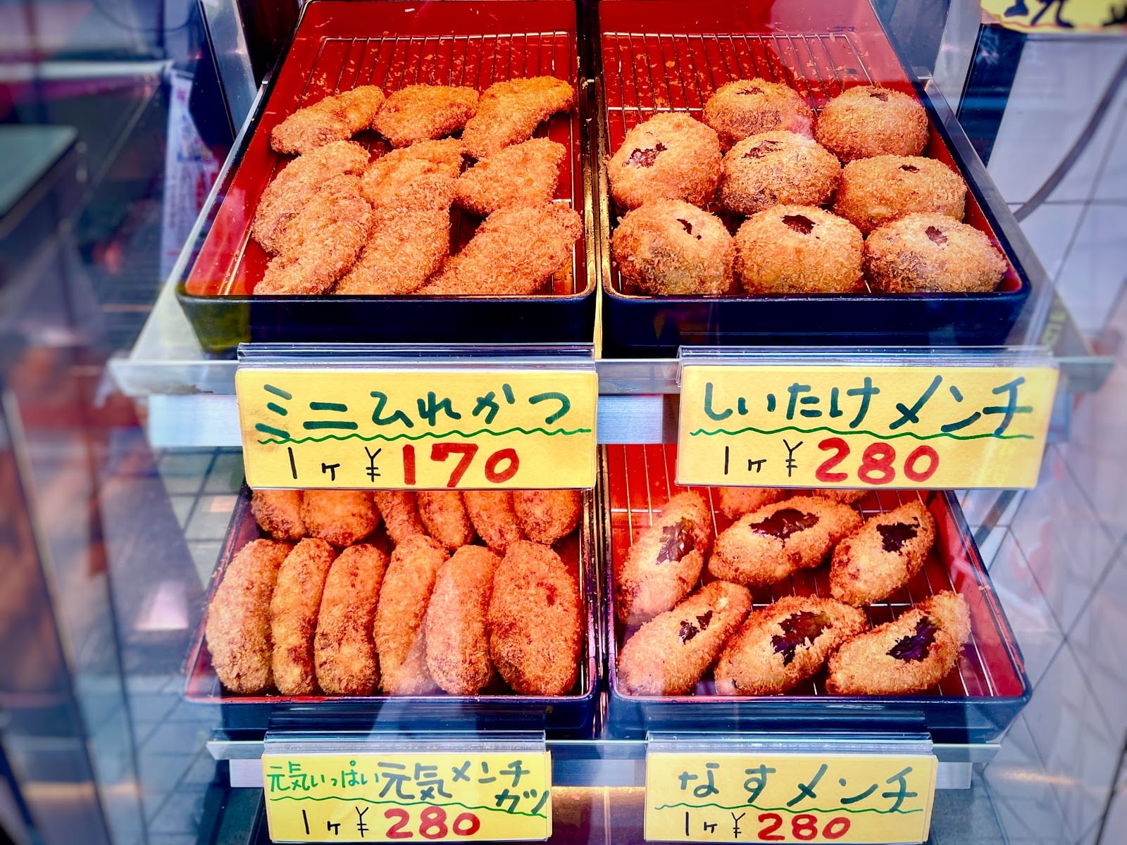The display case of fried snacks at Niku no Suzuki.