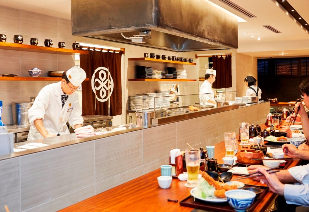The light-filled dining room of Tonkatsu Maisen, a converted Aoyama bathhouse.