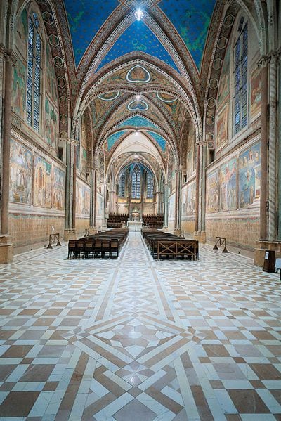 The frescoed vaulted nave of the Basilica of St Francis of Assisi.