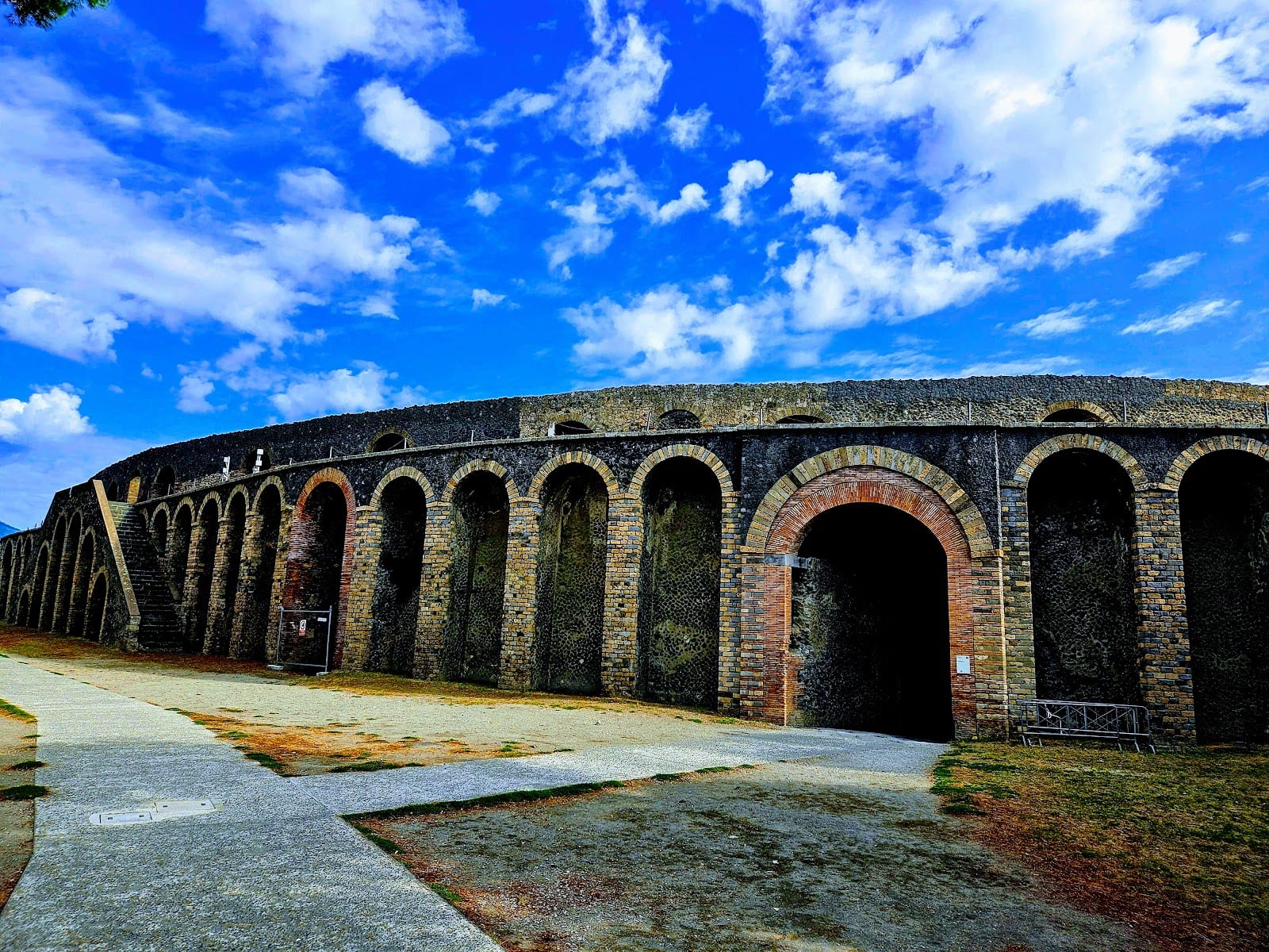 The arcaded outer wall of the amphitheatre at Pompeii.