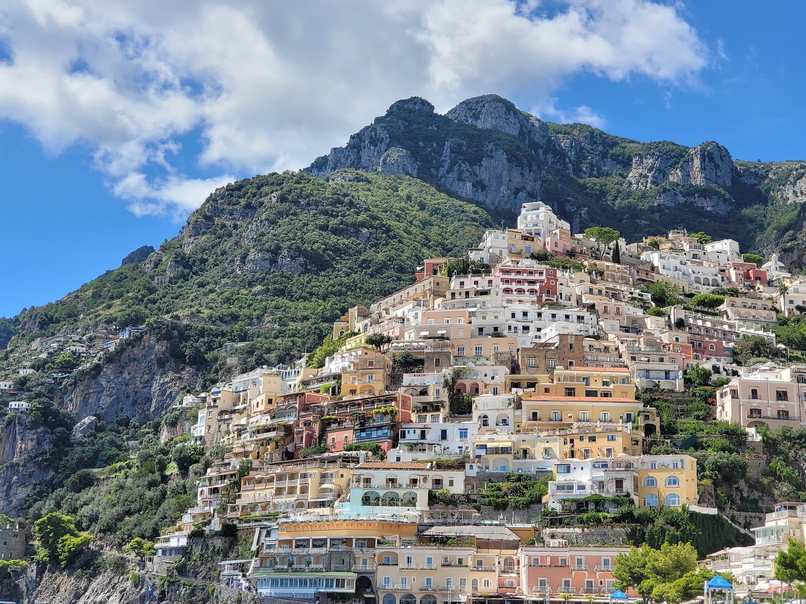 The pastel houses of Positano stacked up the cliffs of the Amalfi Coast.