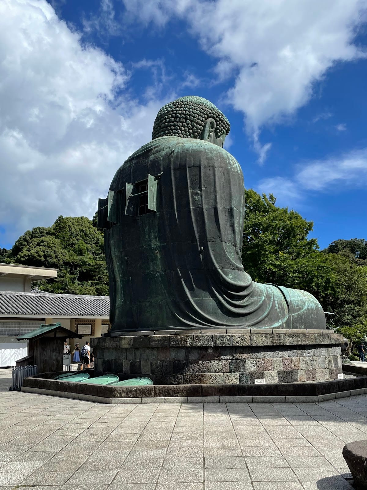 The back of the Great Buddha of Kamakura, showing the windows in its hollow bronze shell.