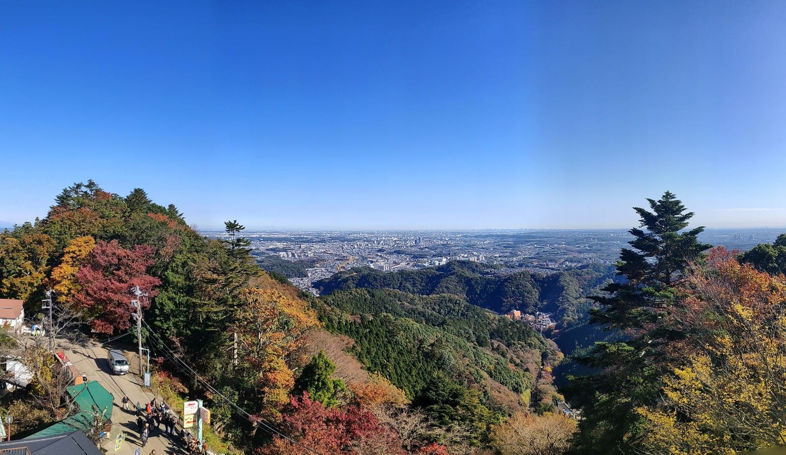 The view over the Kanto plain and forested ridges from Mt. Takao in autumn.