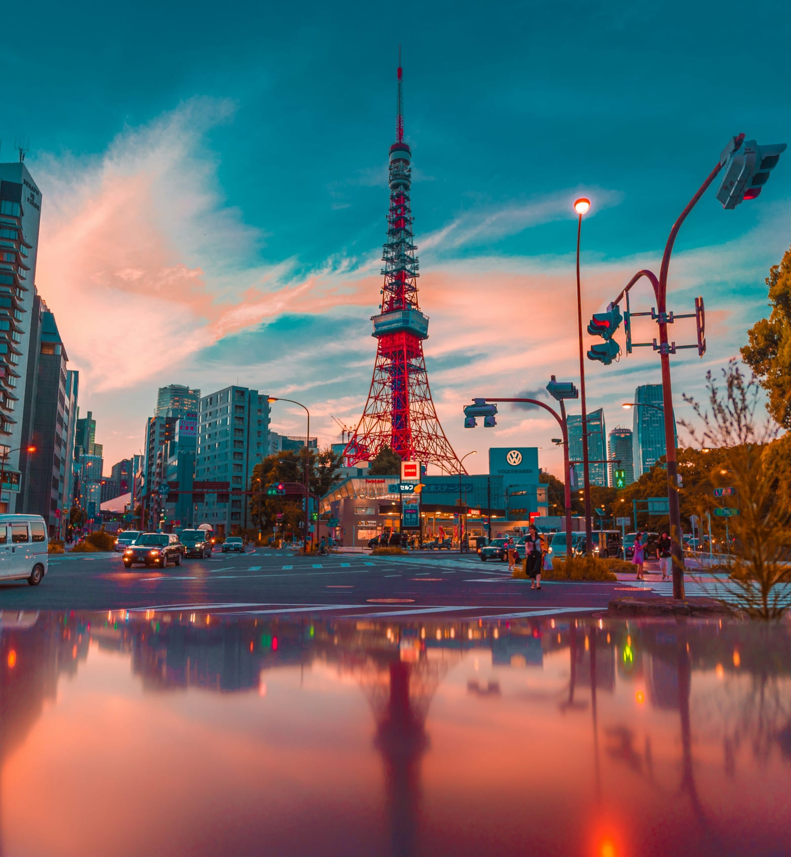 Neon-lit Tokyo street crowded with diners and shoppers in the evening.