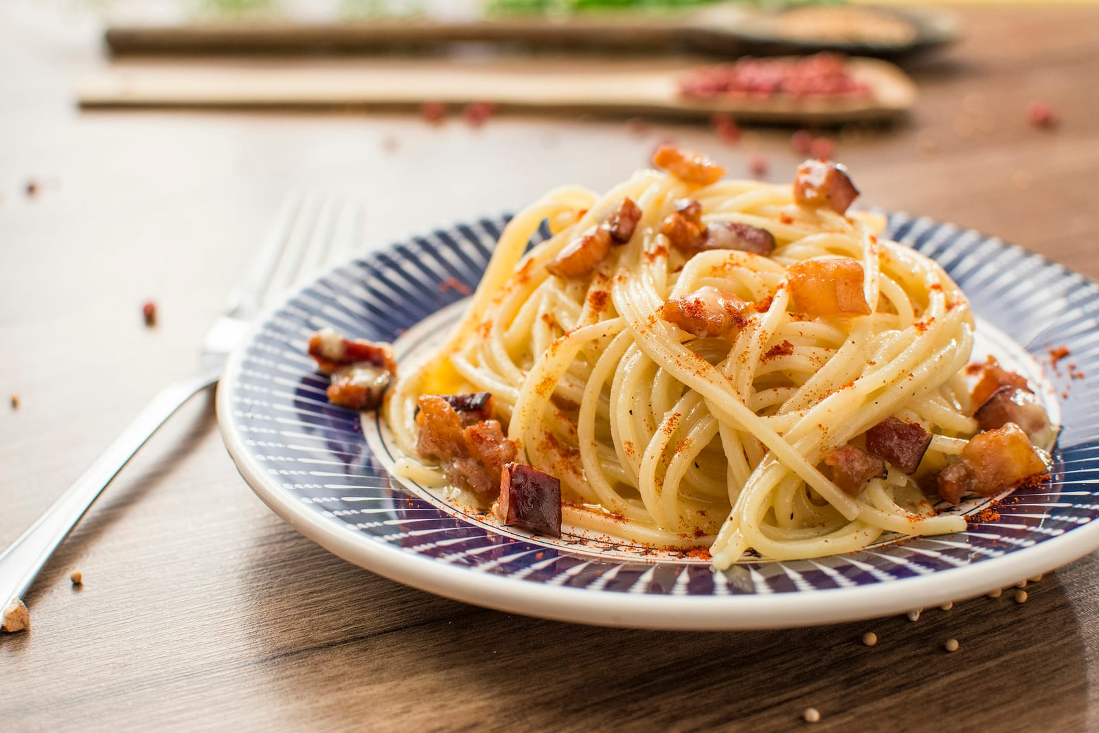 Spaghetti tossed with crisp cubes of guanciale and grated pecorino.