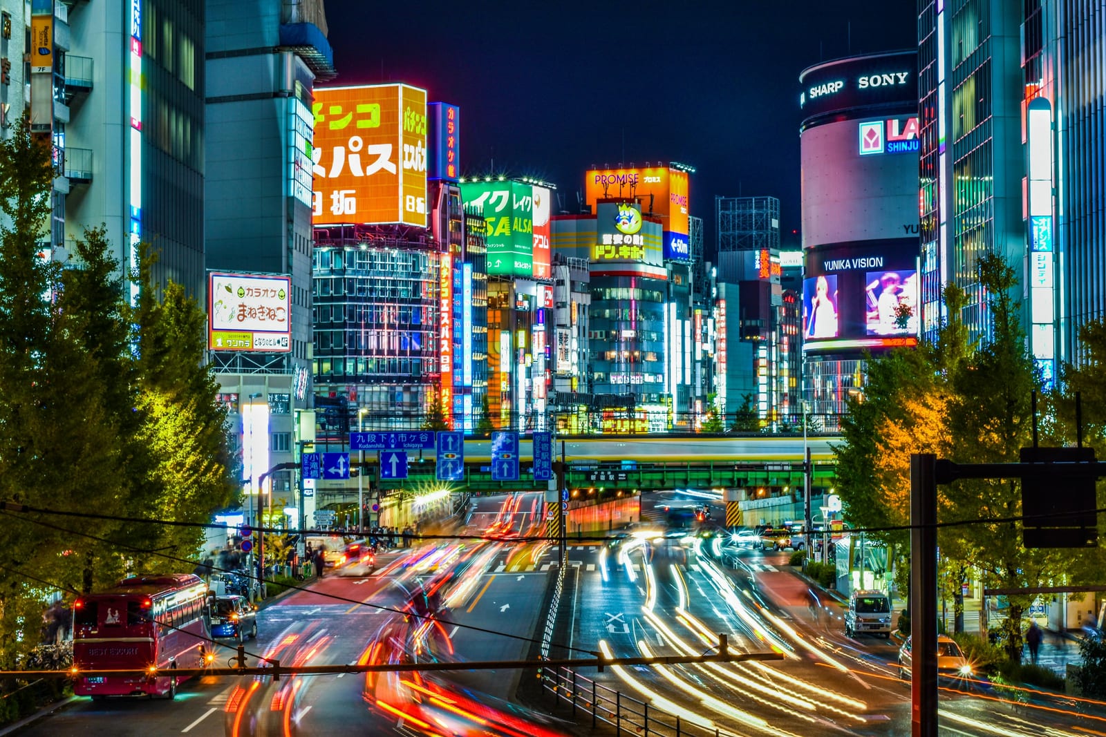 The neon lights of Shinjuku's Kabukicho district at night.