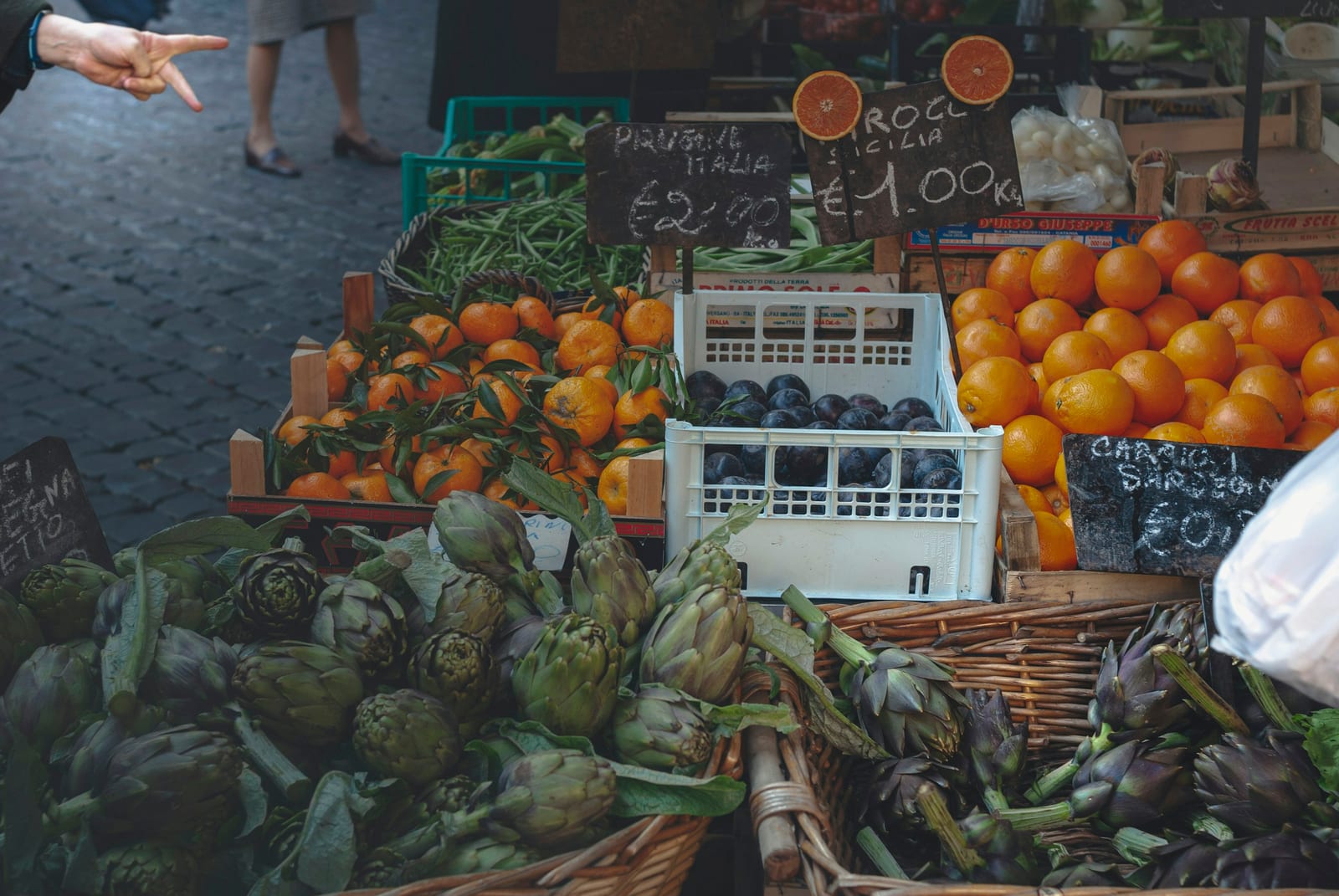 A produce stall piled with fruit and vegetables at the Testaccio market.