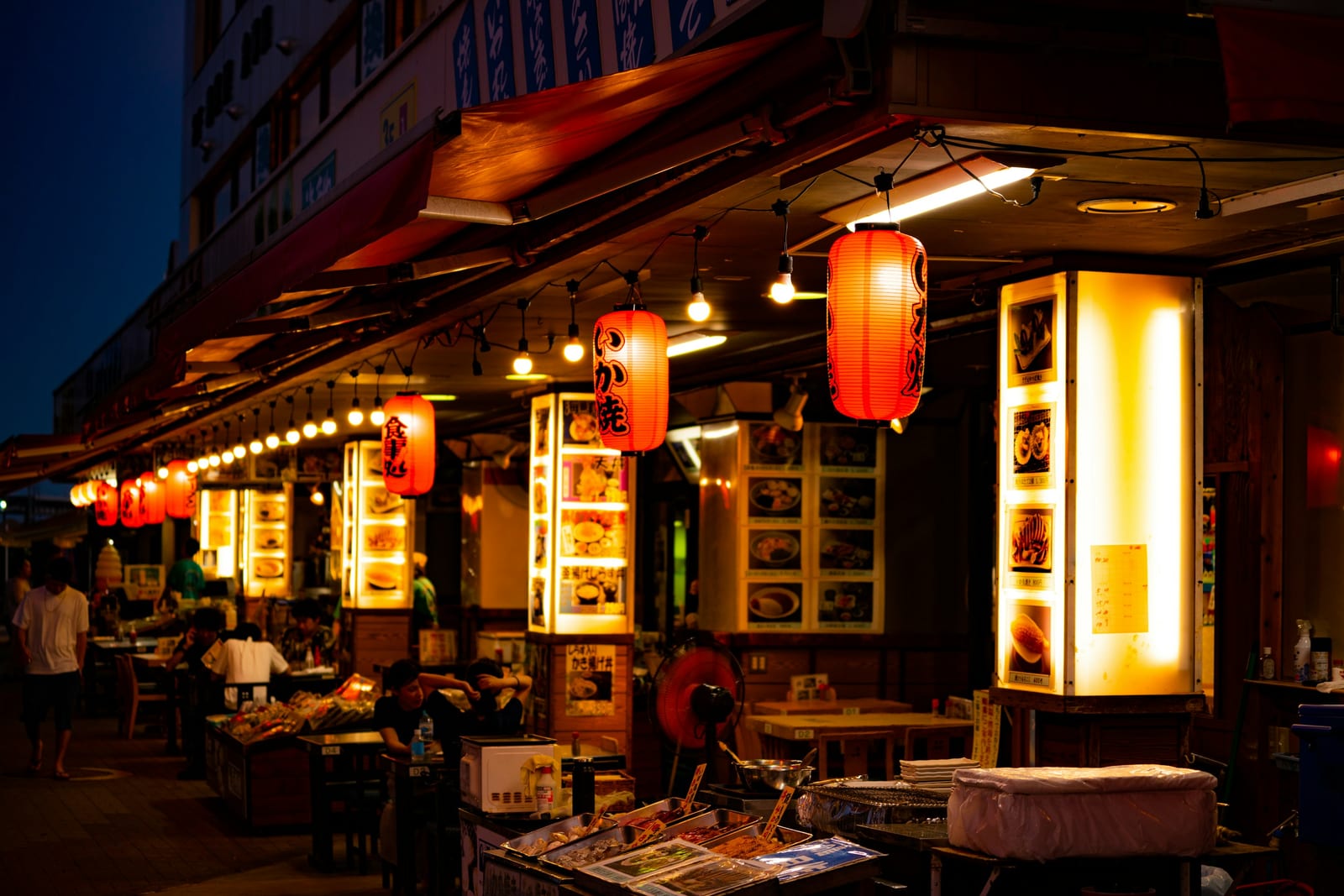 A Japanese street-food stall at night.
