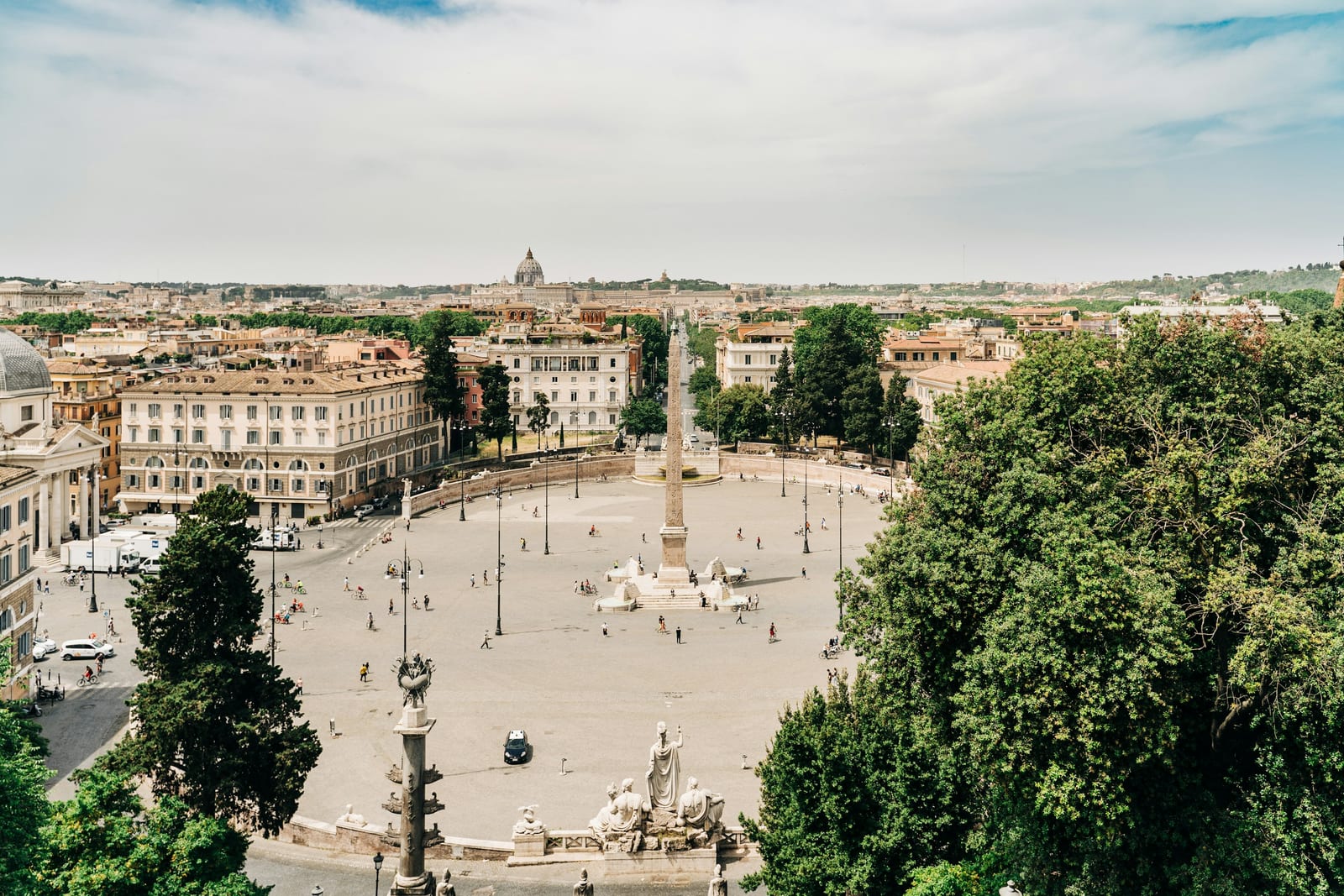 Piazza del Popolo and its obelisk seen from the Pincio terrace in golden light.