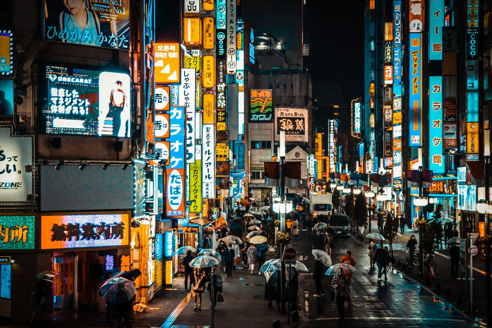 Neon-lit Shinjuku street at night