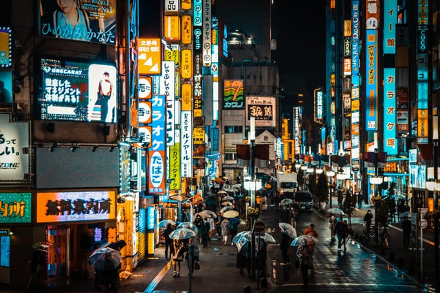 Neon-lit Shinjuku street at night