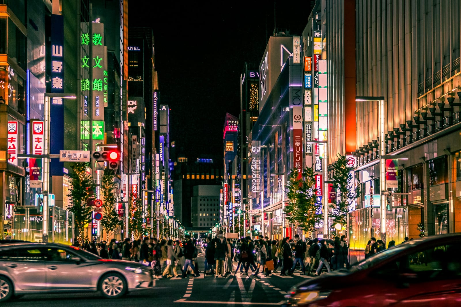 Ginza's main avenue lit up at night.
