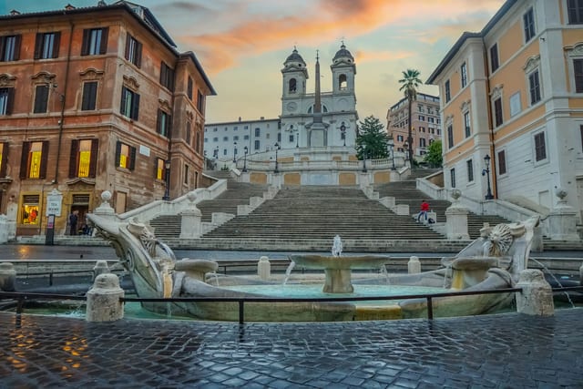 The Barcaccia fountain at the foot of the Spanish Steps in Piazza di Spagna.