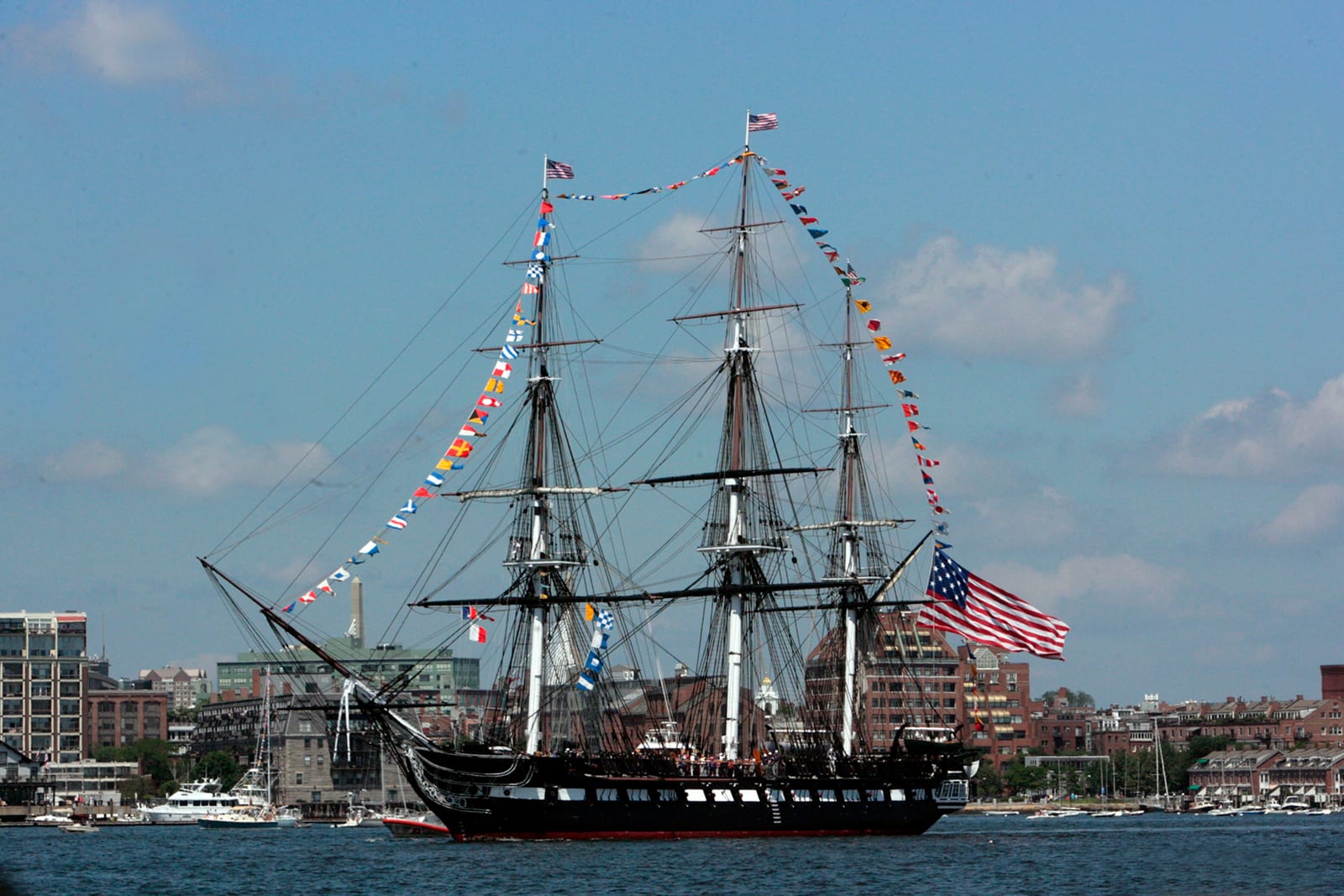 The USS Constitution and the Bunker Hill Monument at the Charlestown Navy Yard, Boston