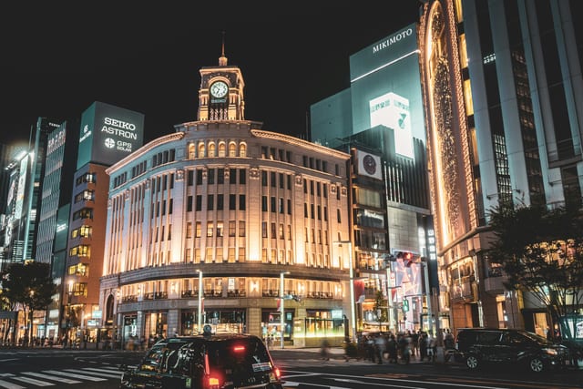 The illuminated Wako clock tower at the Ginza 4-chome crossing