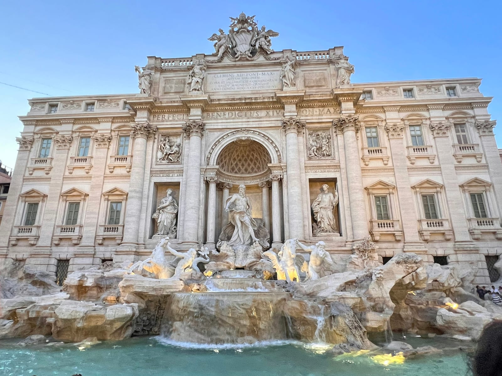 The Trevi Fountain seen head-on in daylight.