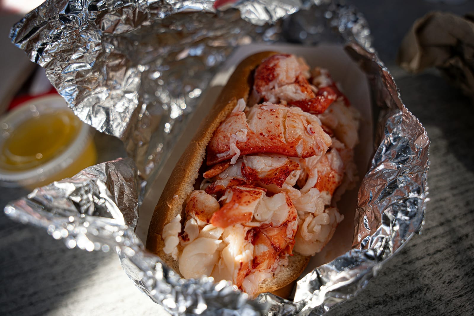 A classic New England lobster roll on a split-top bun