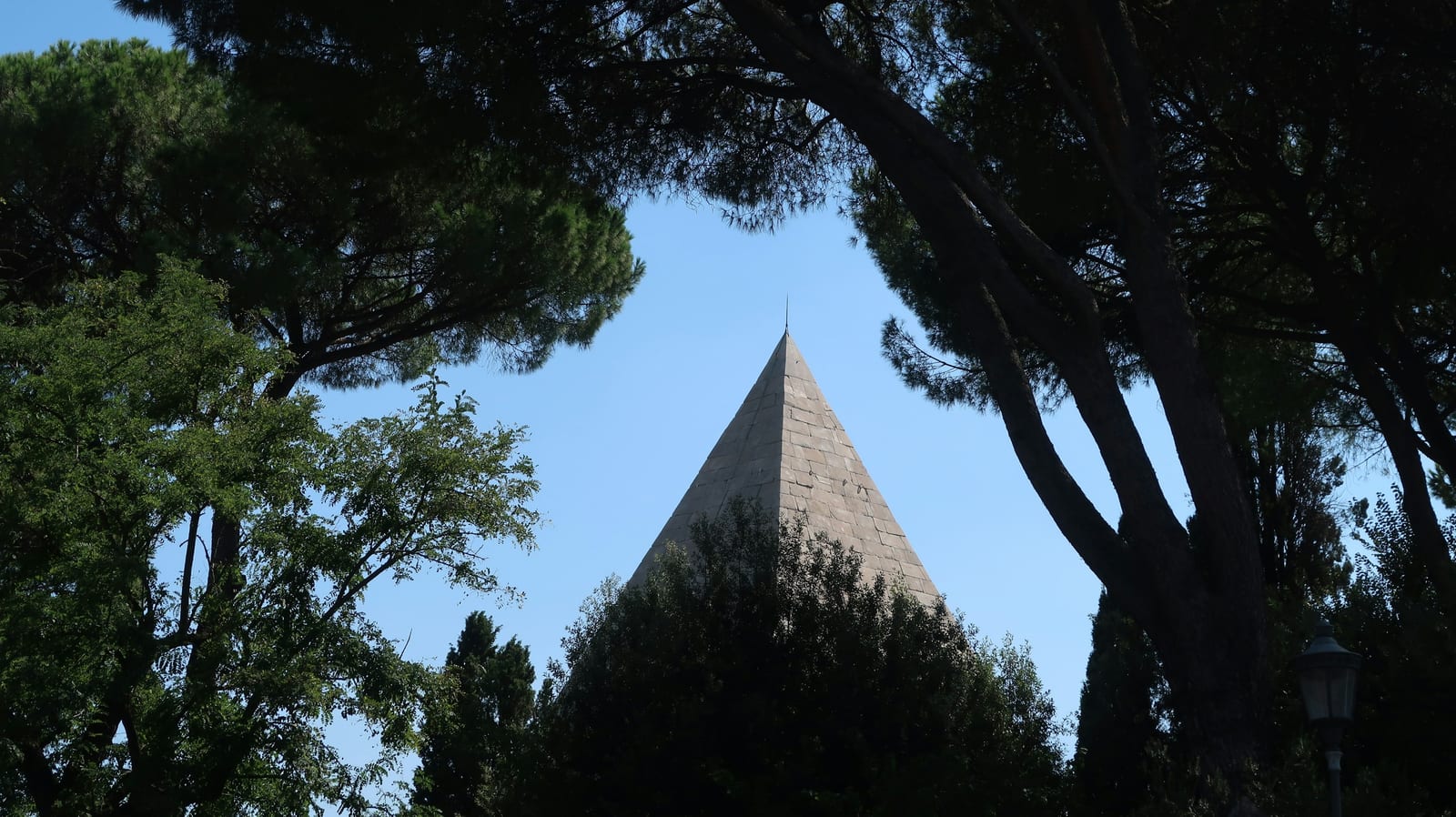The ancient Pyramid of Cestius rising above the trees in Testaccio.