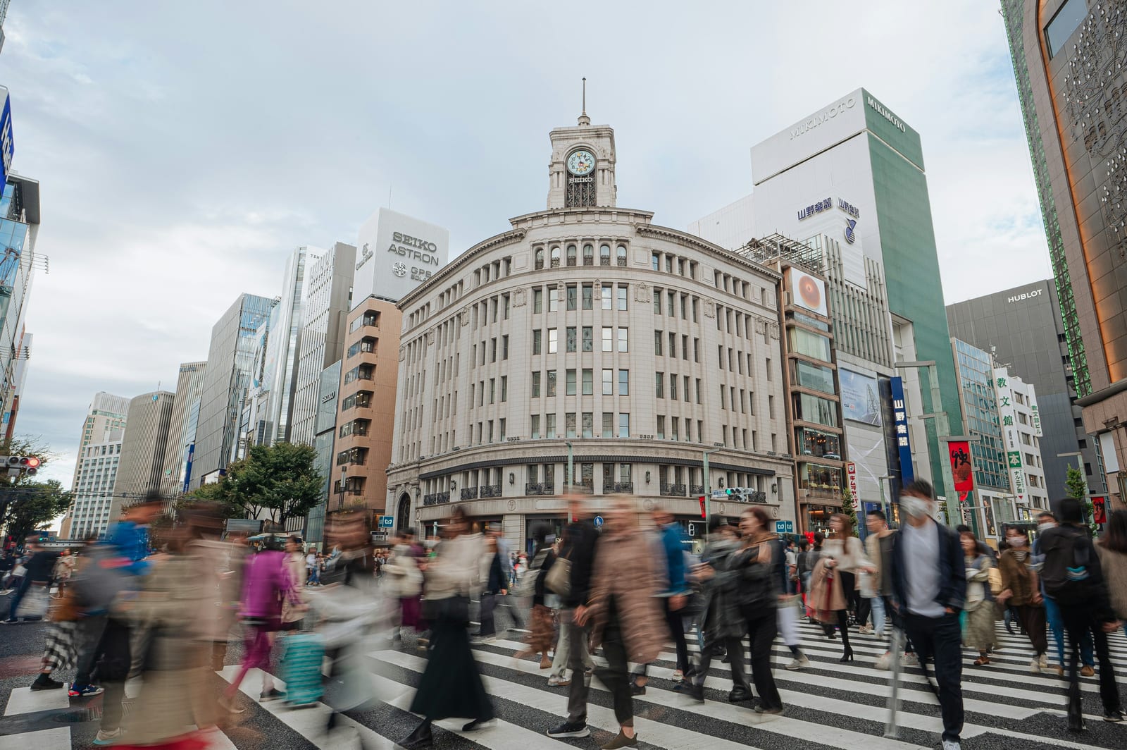 The illuminated Wako clock tower at the Ginza 4-chome crossing