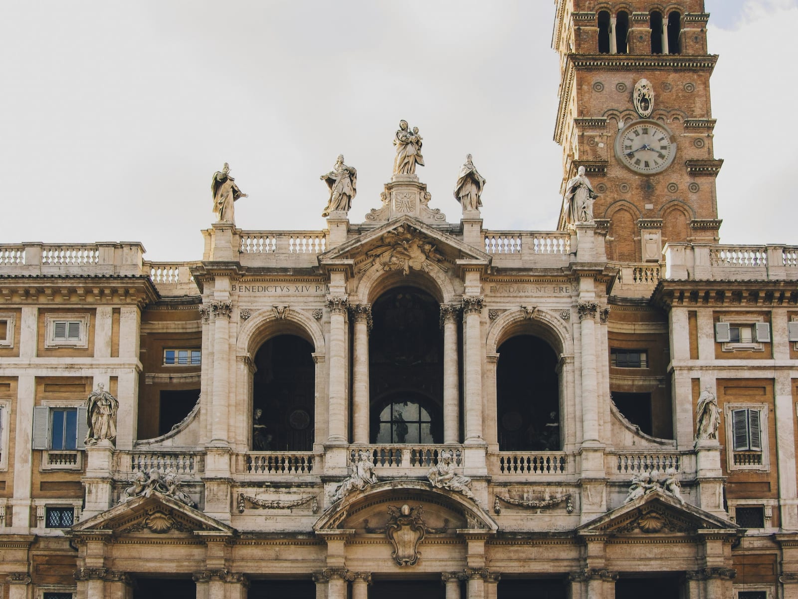 The baroque facade and bell tower of the basilica of Santa Maria Maggiore.