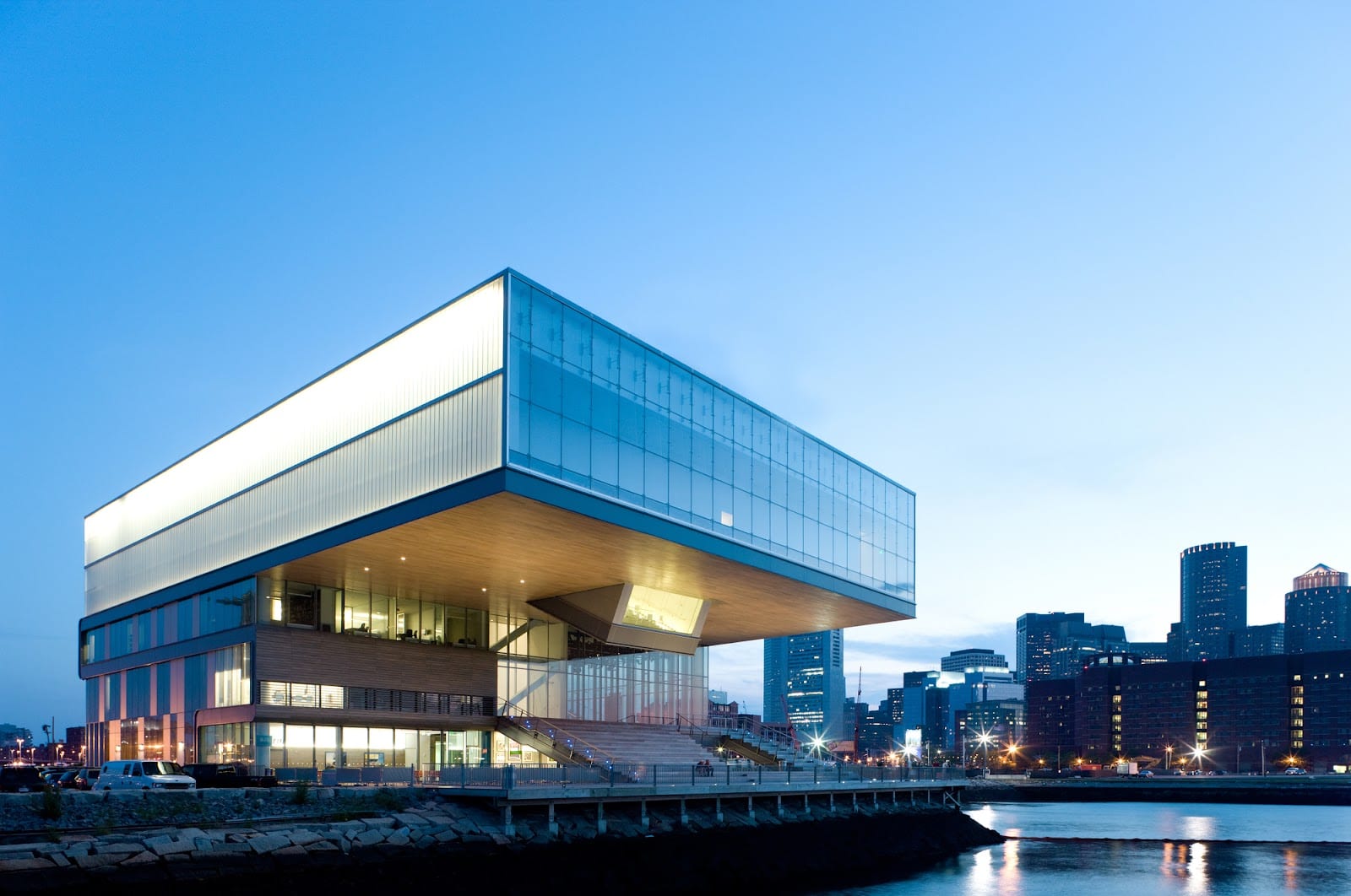 Modern glass buildings along the Seaport harbor