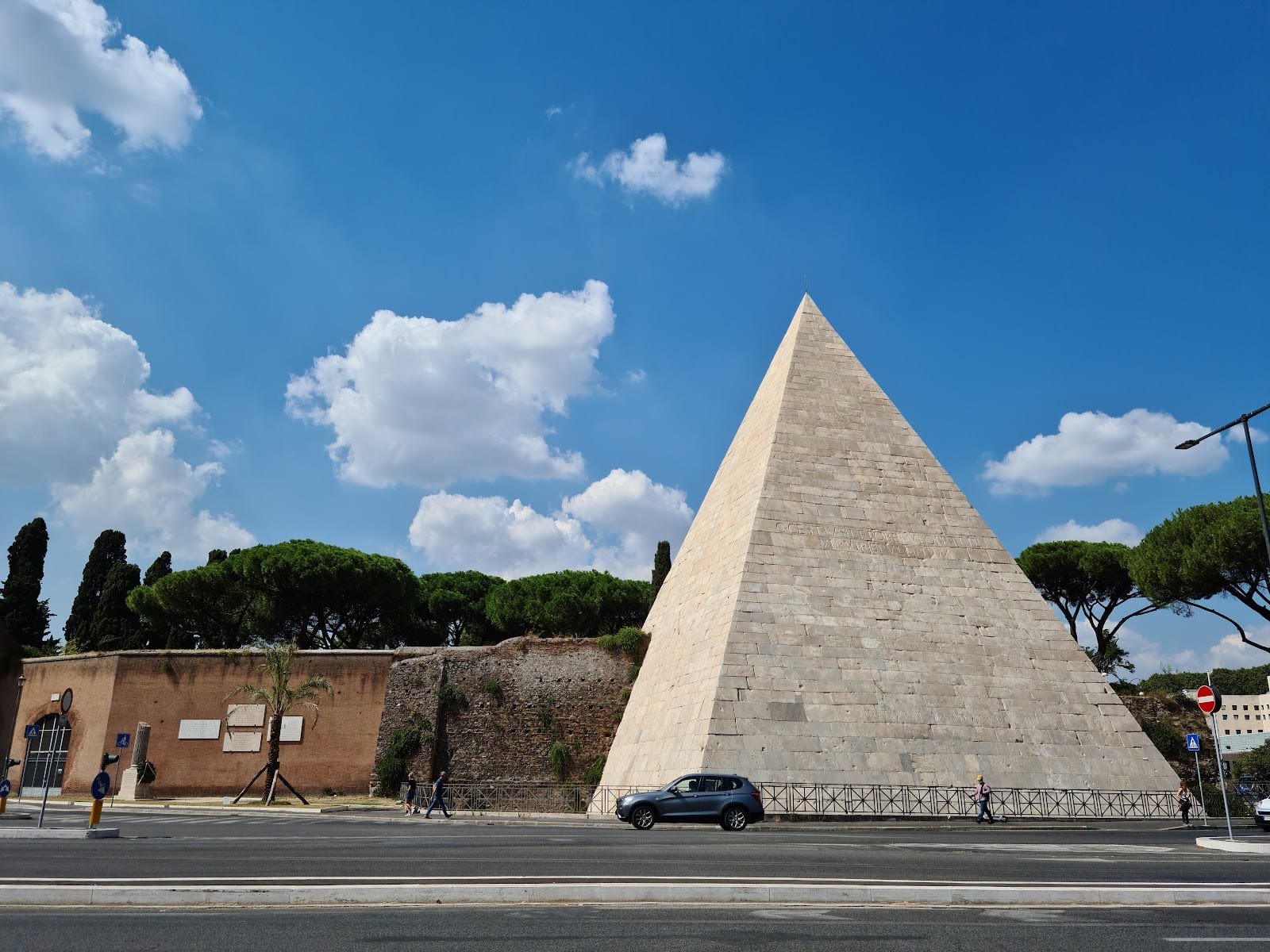 The ancient Pyramid of Cestius rising above the trees in Testaccio.